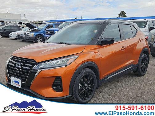 Monarch Orange / Super Black 2023 Nissan Kicks SR