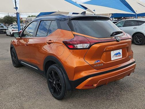 Monarch Orange / Super Black 2023 Nissan Kicks SR