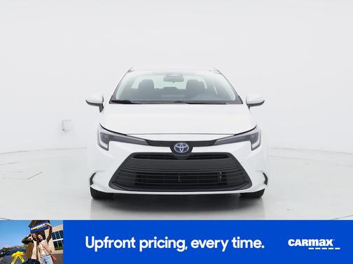 White 2024 Toyota Corolla Hybrid LE