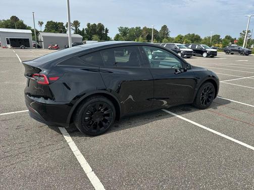 Solid Black 2025 Tesla Model Y Long Range Dual Motor Rear-Wheel Drive