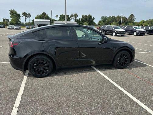 Solid Black 2025 Tesla Model Y Long Range Dual Motor Rear-Wheel Drive