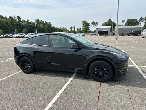 Solid Black 2025 Tesla Model Y Long Range Dual Motor Rear-Wheel Drive