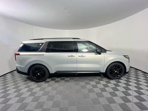 Ivory Silver 2026 Kia Carnival Hybrid SX