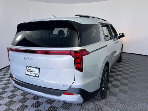 Ivory Silver 2026 Kia Carnival Hybrid EX