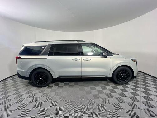 Ivory Silver 2026 Kia Carnival Hybrid SX