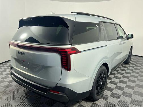 Ivory Silver 2026 Kia Carnival Hybrid SX