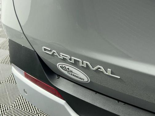 Ceramic Silver 2026 Kia Carnival Hybrid EX
