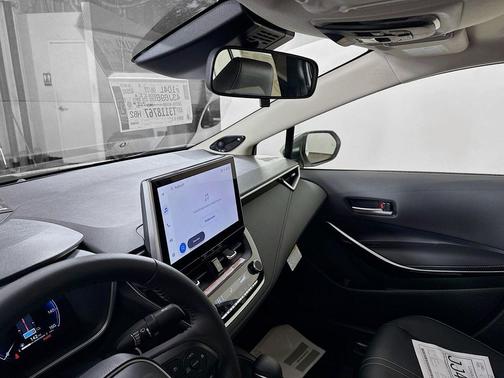 White 2026 Toyota Corolla Hybrid XLE