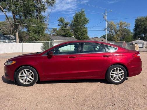 Red 2015 Ford Fusion SE