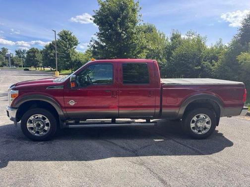 Red 2015 Ford F-250 Lariat