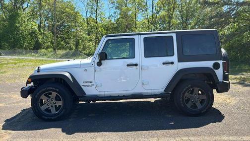 White 2016 Jeep Wrangler Unlimited Sport