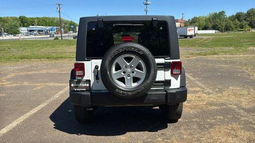 White 2016 Jeep Wrangler Unlimited Sport