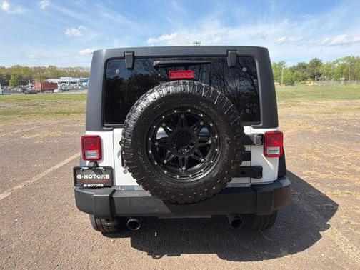 White 2016 Jeep Wrangler Unlimited Sport