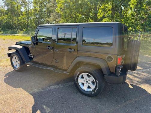 Black 2015 Jeep Wrangler Unlimited Sport