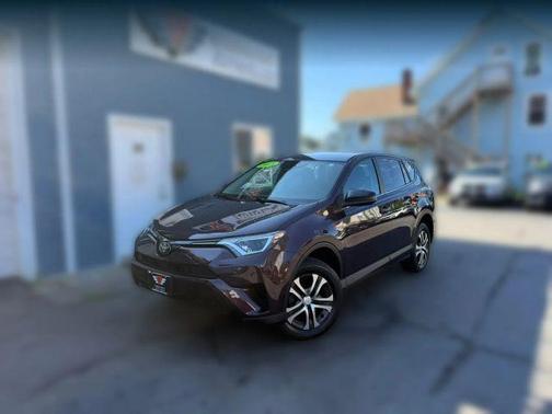 Red 2018 Toyota RAV4 LE