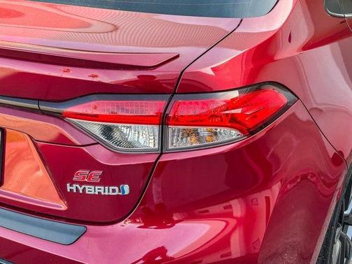 Ruby Flare Pearl 2023 Toyota Corolla Hybrid SE