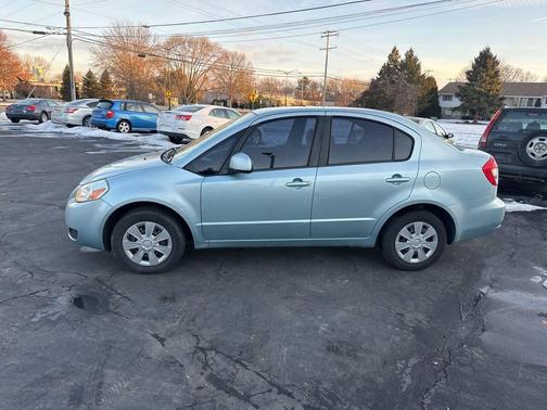 2009 Suzuki SX4 LE 4dr Sedan 4A