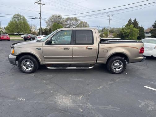 Tan 2002 Ford F-150 Lariat SuperCrew