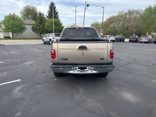 Tan 2002 Ford F-150 Lariat SuperCrew