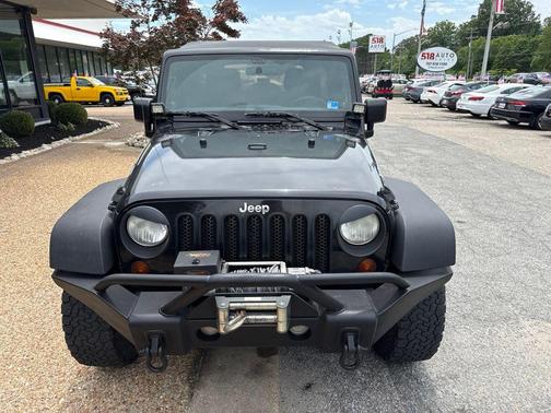 Black Clearcoat 2012 Jeep Wrangler Unlimited Sport