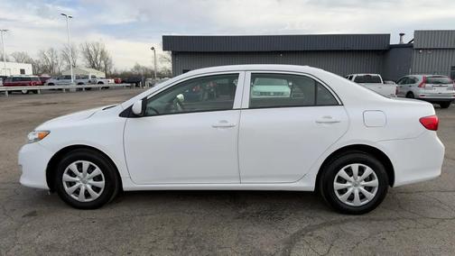 Super White 2010 Toyota Corolla LE