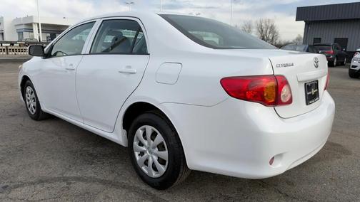Super White 2010 Toyota Corolla LE