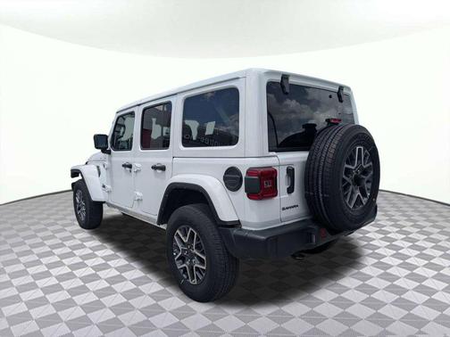 Bright White Clearcoat 2025 Jeep Wrangler 4-Door Sahara 4x4