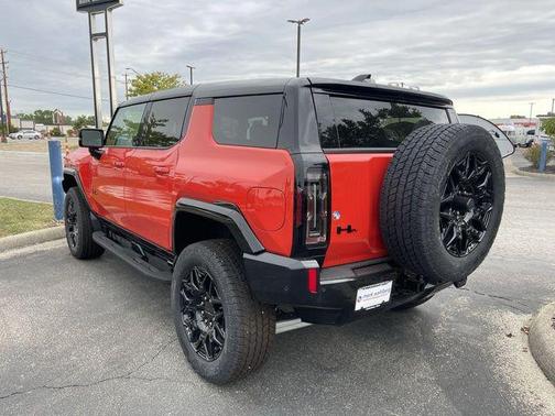 Solar Orange 2025 GMC HUMMER EV SUV 2X