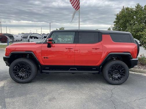 Solar Orange 2025 GMC HUMMER EV SUV 2X
