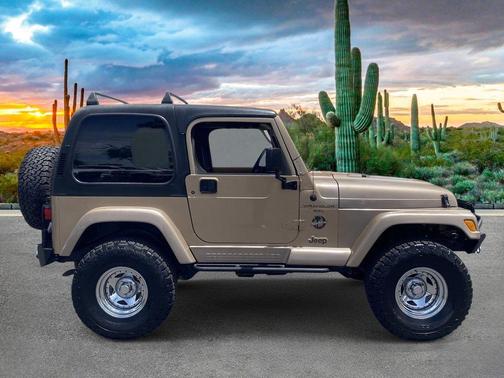 Tan 2001 Jeep Wrangler Sahara