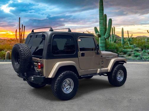 Tan 2001 Jeep Wrangler Sahara