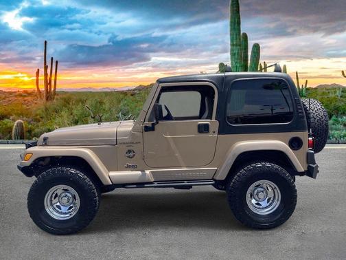 Tan 2001 Jeep Wrangler Sahara