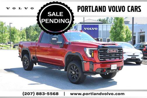 Volcanic Red Tintcoat 2025 GMC Sierra 2500 AT4