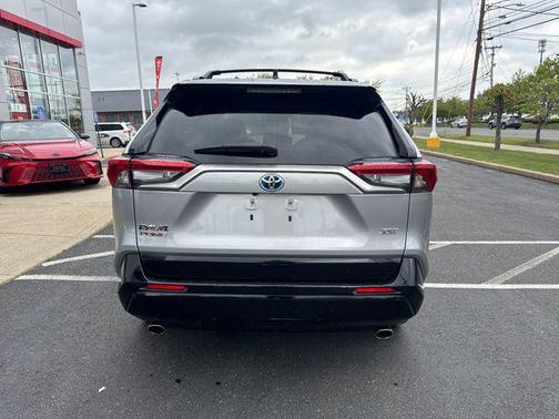Silver Sky Metallic/Midnight Black Metallic 2023 Toyota RAV4 Prime XSE