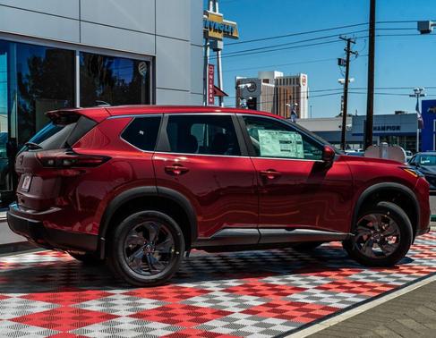Scarlet Ember 2026 Nissan Rogue SV