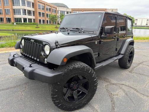 Black Clearcoat 2014 Jeep Wrangler Unlimited Sport
