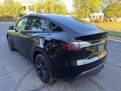 Solid Black 2025 Tesla Model Y Long Range Dual Motor All-Wheel Drive