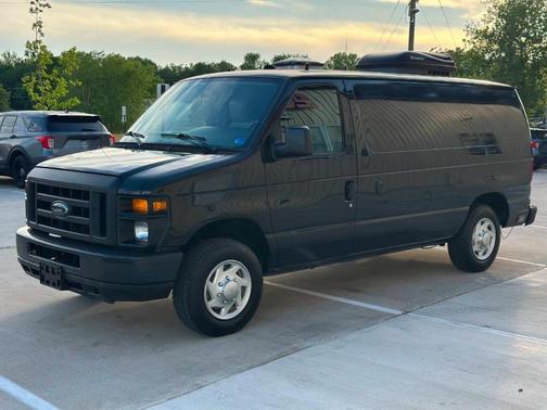 Black 2009 Ford E150 Cargo