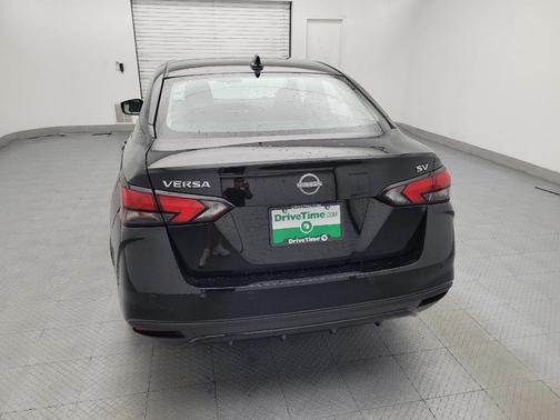 Super Black 2024 Nissan Versa 1.6 SV