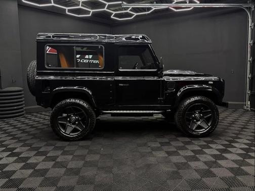 Black 1997 Land Rover Defender Widebody Kahn Edition