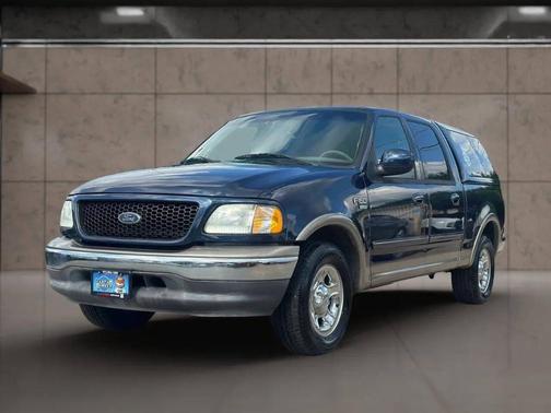 Blue 2002 Ford F-150 King Ranch SuperCrew