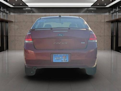 Red 2009 Ford Focus SES