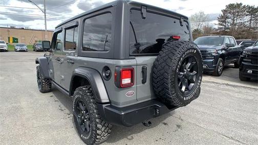 Photo 2 of 6 of 2021 Jeep Wrangler Unlimited Sport