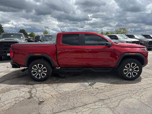 Volcanic Red Tintcoat 2024 GMC Canyon AT4