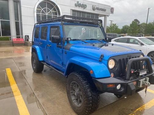 Photo 2 of 5 of 2014 Jeep Wrangler Unlimited Sahara