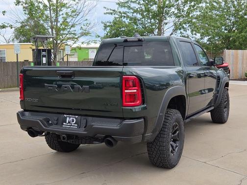 Serrano Green Metallic 2026 RAM 1500 RHO Crew Cab 4x4 5'7' Box