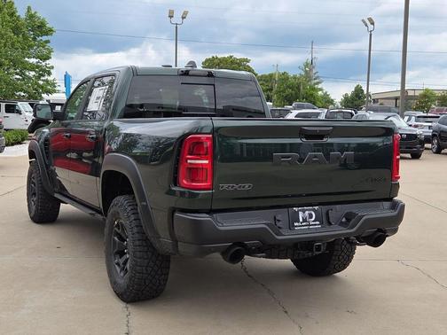 Serrano Green Metallic 2026 RAM 1500 RHO Crew Cab 4x4 5'7' Box