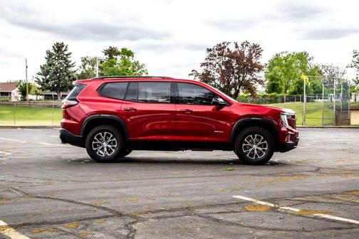 Volcanic Red Tintcoat 2024 GMC Acadia AWD AT4