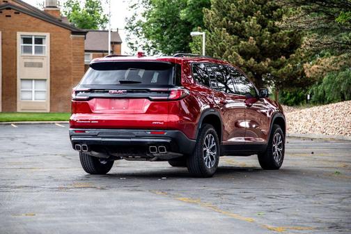 Volcanic Red Tintcoat 2024 GMC Acadia AWD AT4