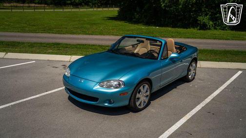 blue 2001 Mazda MX-5 Miata